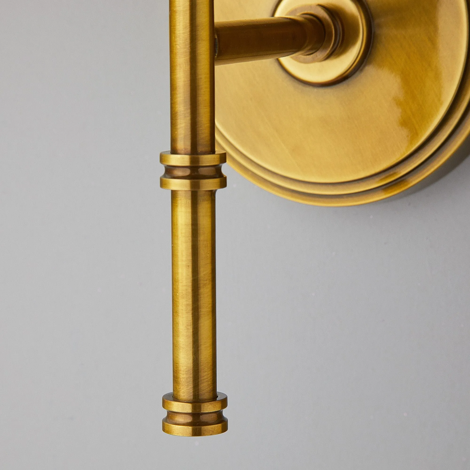 Single Chukka Wall fitting in antiqued brass